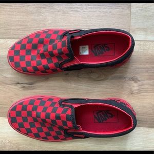 Red and black checkered vans.  Worn once.
